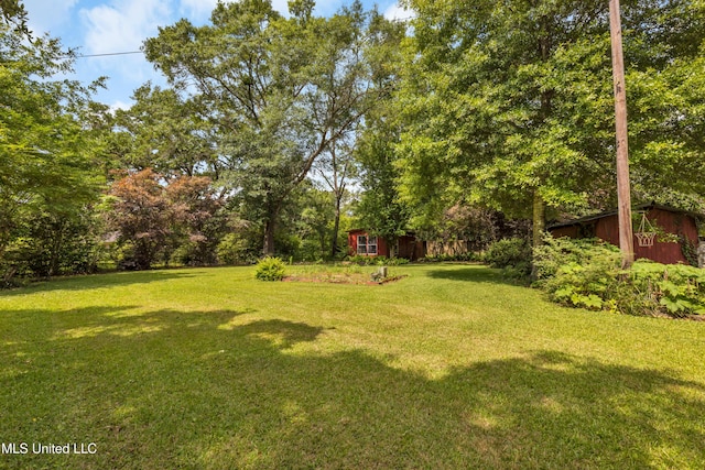 9618 Paige Bayou Rd, Vancleave, MS 39565 - view of grassy yard featuring an outbuilding