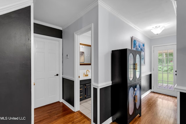 9618 Paige Bayou Rd, Vancleave, MS 39565 - entrance foyer featuring wood finished floors, crown molding, and baseboards
