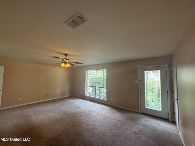 104 Mcgregor Way, Natchez, MS 39120 - unfurnished room with baseboards, ceiling fan, carpet, and visible vents
