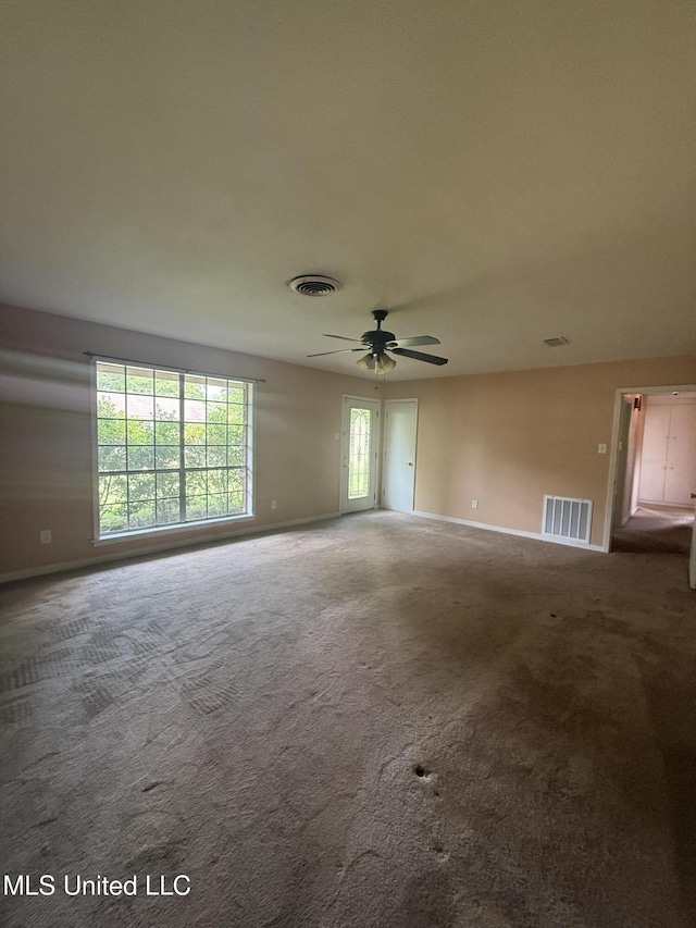 104 Mcgregor Way, Natchez, MS 39120 - unfurnished room with baseboards, visible vents, ceiling fan, and carpet