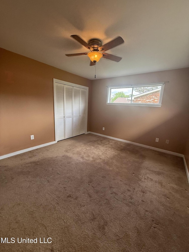104 Mcgregor Way, Natchez, MS 39120 - unfurnished bedroom featuring baseboards, ceiling fan, carpet, and a closet