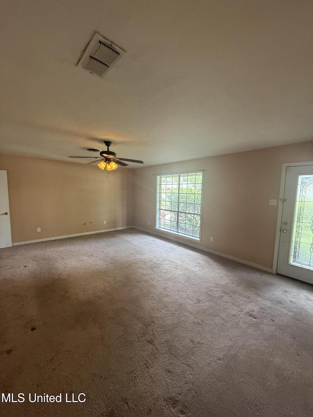 104 Mcgregor Way, Natchez, MS 39120 - unfurnished room featuring carpet floors, plenty of natural light, and visible vents