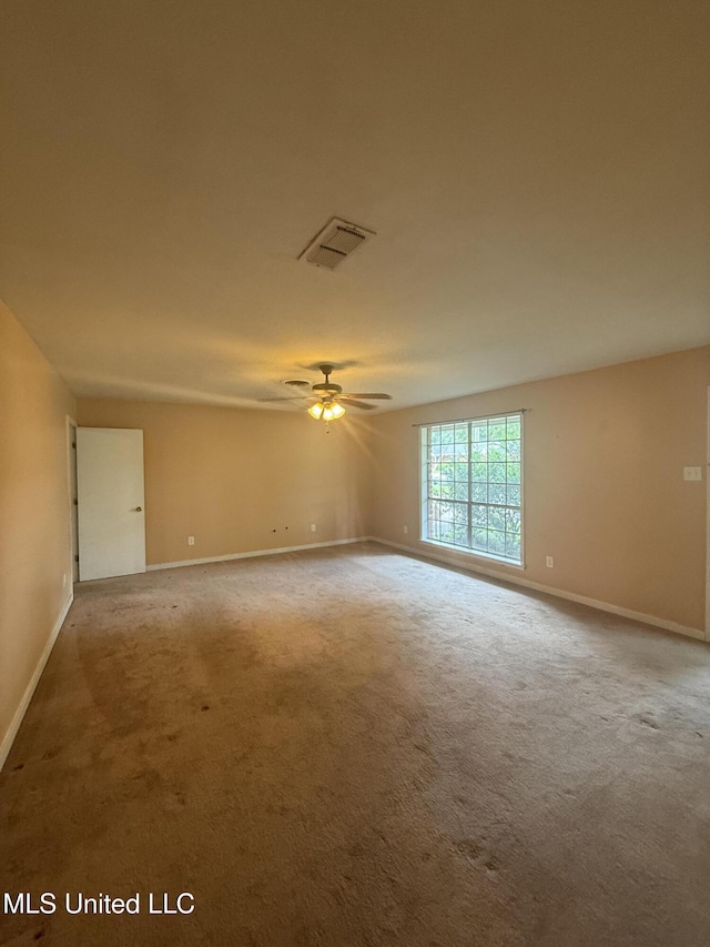 104 Mcgregor Way, Natchez, MS 39120 - spare room featuring baseboards, carpet, a ceiling fan, and visible vents