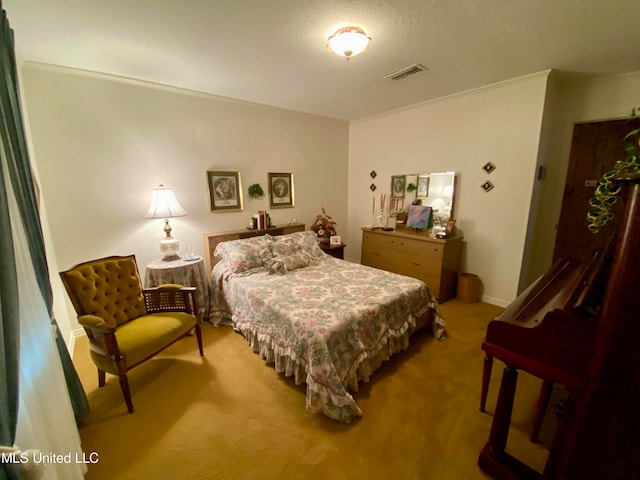 bedroom featuring light carpet