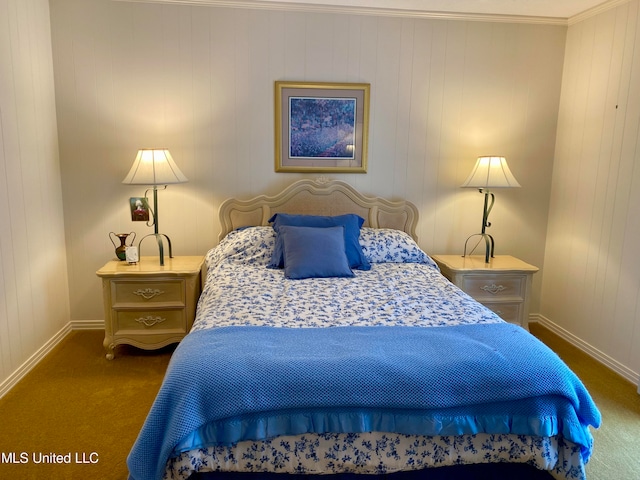 bedroom with ornamental molding, carpet, and wooden walls