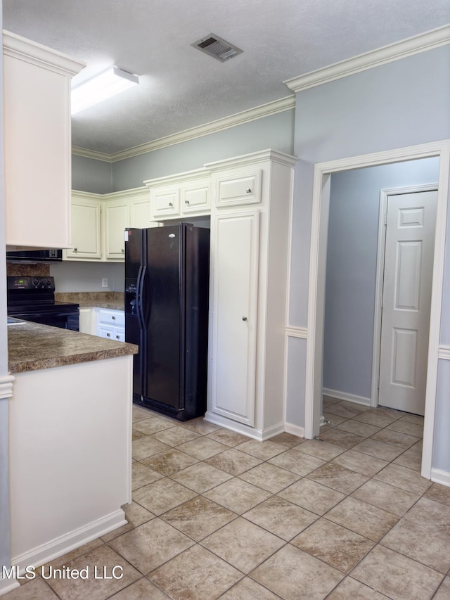 kitchen featuring crown molding, white cabinets, black appliances, and a textured ceiling