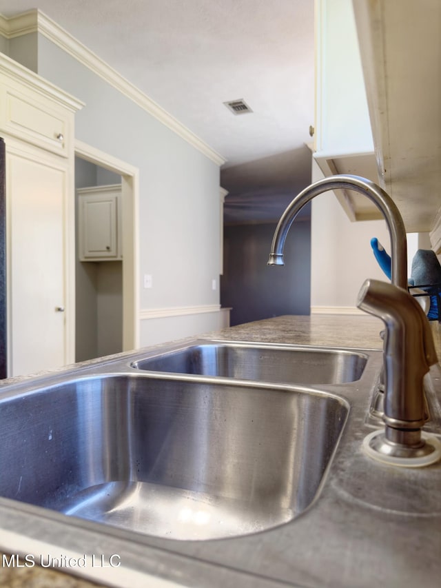 details with ornamental molding and sink