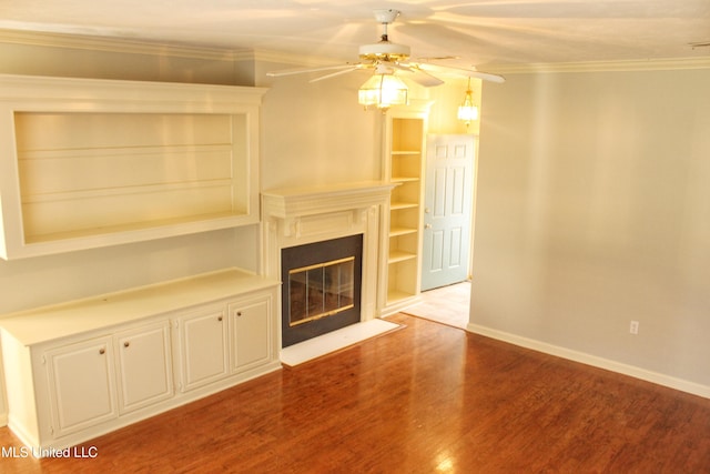 unfurnished living room with light hardwood / wood-style flooring, ceiling fan, and crown molding