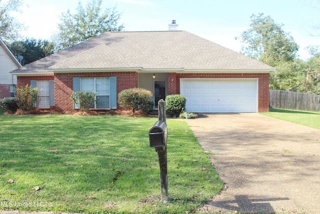 ranch-style house featuring a garage and a front lawn