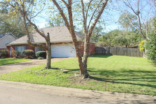 view of front facade featuring a front lawn and a garage