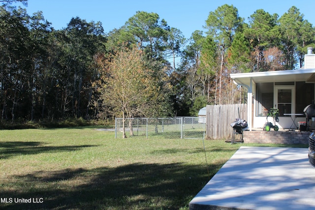 view of yard with a sunroom