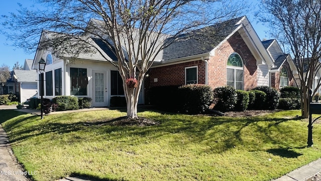 view of front of home with a front lawn