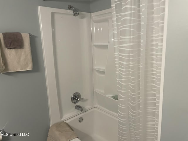 full bathroom with shower / bath combination with curtain