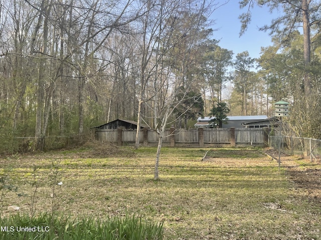 view of yard featuring fence