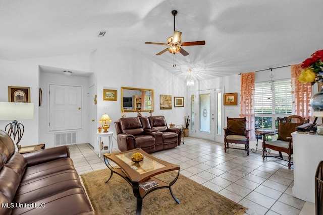 99102 Koloa St, Diamondhead, MS 39525 - living area with light tile patterned floors, ceiling fan, and high vaulted ceiling