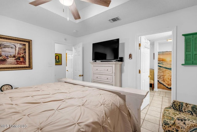 99102 Koloa St, Diamondhead, MS 39525 - bedroom featuring light tile patterned flooring and a ceiling fan