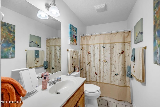 99102 Koloa St, Diamondhead, MS 39525 - full bath featuring vanity, tile patterned floors, a shower with curtain, and a textured ceiling