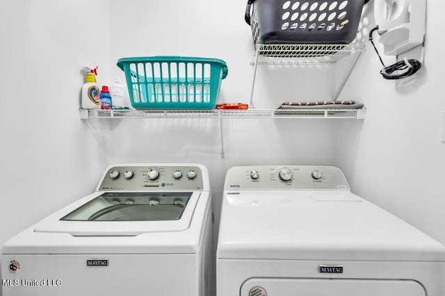 99102 Koloa St, Diamondhead, MS 39525 - washroom with washer and clothes dryer
