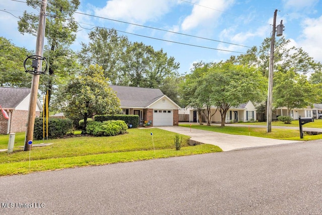 99102 Koloa St, Diamondhead, MS 39525 - view of front of property with driveway, an attached garage, brick siding, and a front lawn
