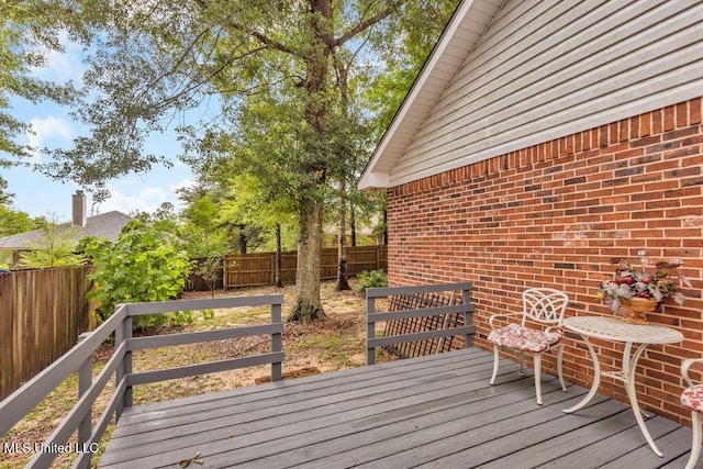 99102 Koloa St, Diamondhead, MS 39525 - wooden terrace featuring a fenced backyard