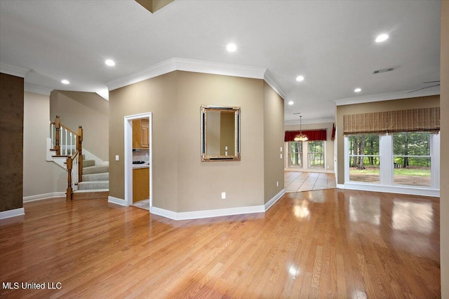 unfurnished living room with recessed lighting, baseboards, ornamental molding, and light wood-style flooring