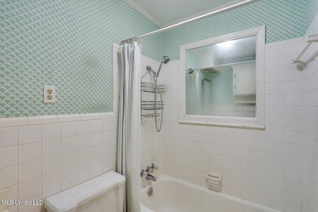 223 Hannah Dr, Clinton, MS 39056 - full bathroom with wallpapered walls, shower / tub combo with curtain, tile walls, toilet, and wainscoting