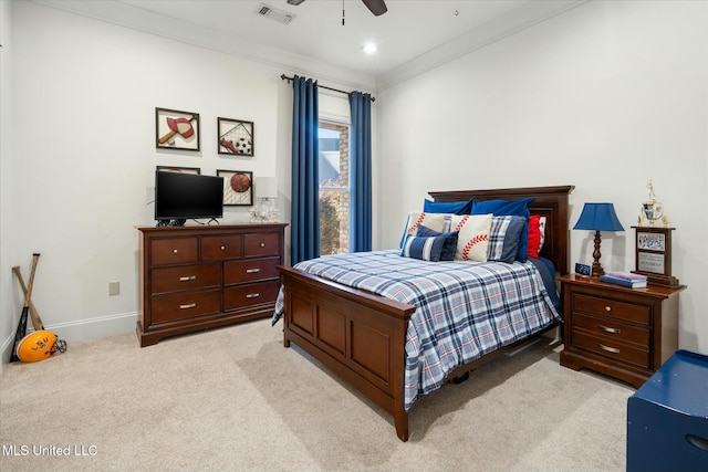 bedroom with light colored carpet, ceiling fan, and crown molding