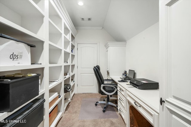 home office featuring crown molding, light colored carpet, and lofted ceiling