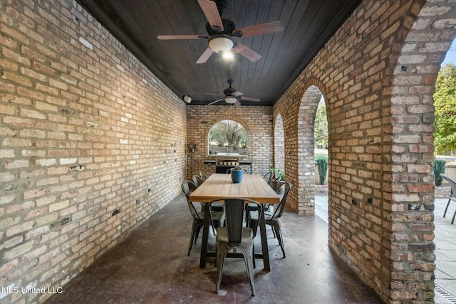 view of patio featuring a grill and ceiling fan