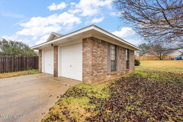 garage with a lawn