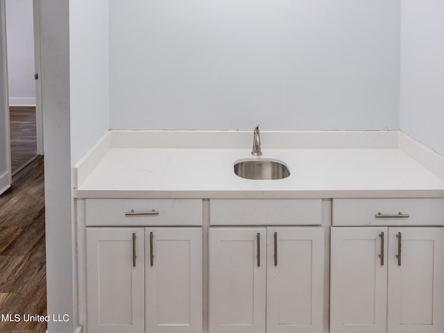 bathroom featuring vanity and hardwood / wood-style flooring