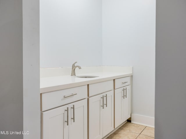 bathroom with vanity and tile patterned floors