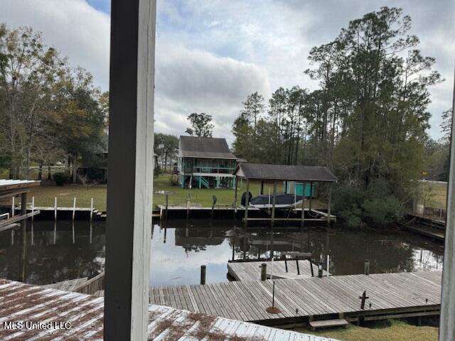 dock area featuring a water view