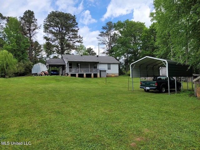 view of yard with a carport