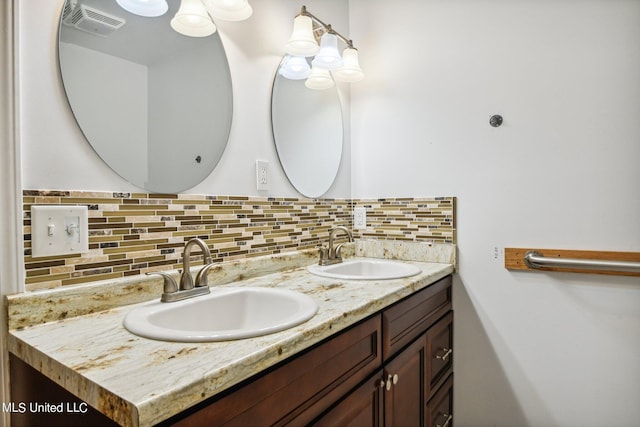 bathroom with vanity and backsplash