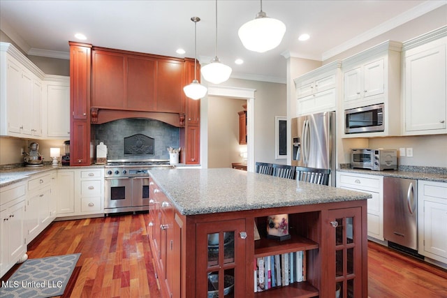 5264 Chappel Cv, Olive Branch, MS 38654 - kitchen featuring appliances with stainless steel finishes, open shelves, a kitchen island, recessed lighting, and crown molding
