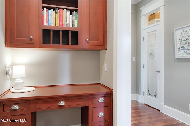 5264 Chappel Cv, Olive Branch, MS 38654 - unfurnished office with built in desk, wood finished floors, and baseboards