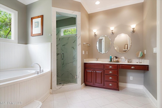 5264 Chappel Cv, Olive Branch, MS 38654 - bathroom featuring healthy amount of natural light, vanity, a garden tub, and a marble finish shower