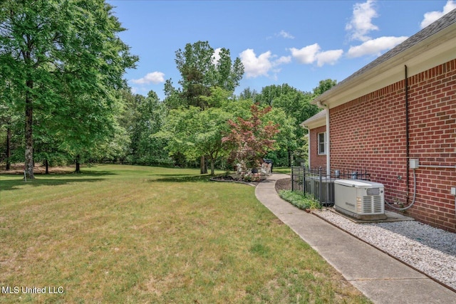5264 Chappel Cv, Olive Branch, MS 38654 - view of green lawn featuring central AC unit