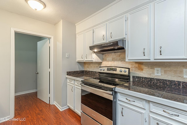 kitchen with white cabinetry, dark hardwood / wood-style floors, a textured ceiling, decorative backsplash, and stainless steel electric stove