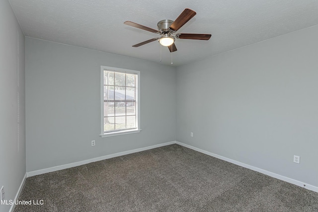 carpeted empty room with ceiling fan and a textured ceiling