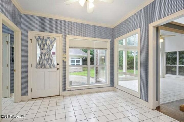 7828 Loa Pl, Diamondhead, MS 39525 - doorway to outside with crown molding, ceiling fan, and wallpapered walls