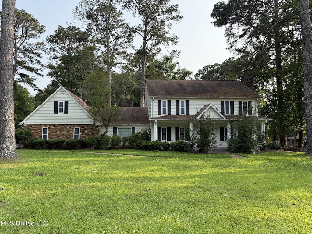 5123 Forest Hill Rd, Byram, MS 39272 - colonial inspired home featuring a front lawn