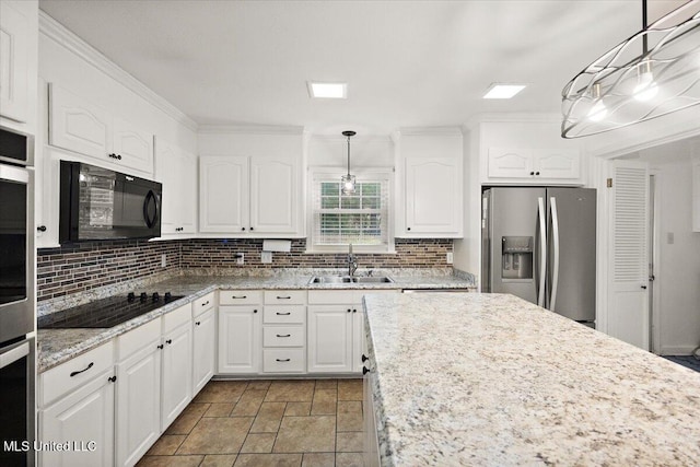5123 Forest Hill Rd, Byram, MS 39272 - kitchen featuring black appliances, a sink, backsplash, white cabinets, and ornamental molding