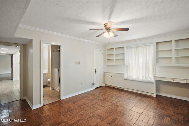 5123 Forest Hill Rd, Byram, MS 39272 - unfurnished bedroom with baseboards, a textured ceiling, ornamental molding, connected bathroom, and ceiling fan