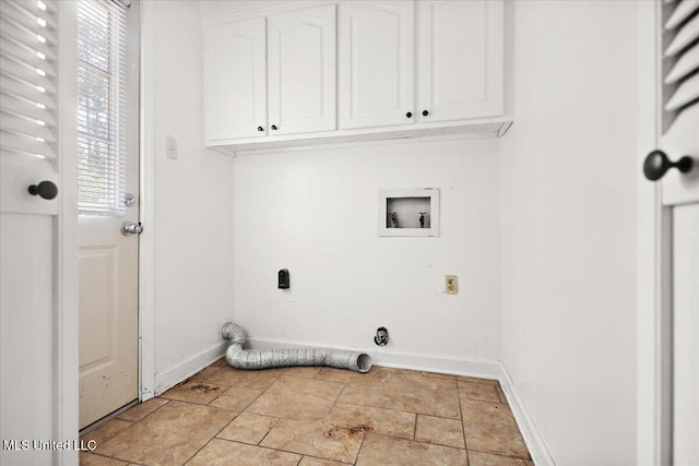 5123 Forest Hill Rd, Byram, MS 39272 - laundry room with washer hookup, cabinet space, baseboards, and light stone finish floors