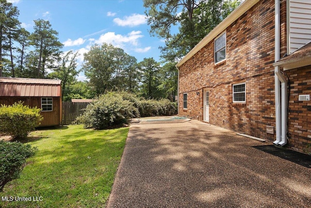 5123 Forest Hill Rd, Byram, MS 39272 - view of yard with an outbuilding and a patio