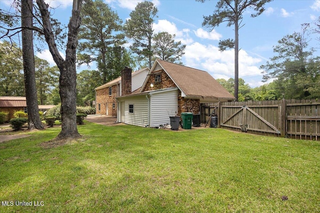 5123 Forest Hill Rd, Byram, MS 39272 - view of side of property with a chimney and a gate