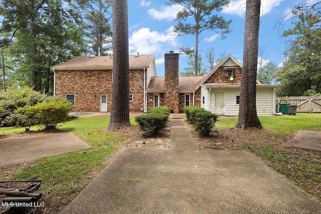5123 Forest Hill Rd, Byram, MS 39272 - view of front facade with a chimney