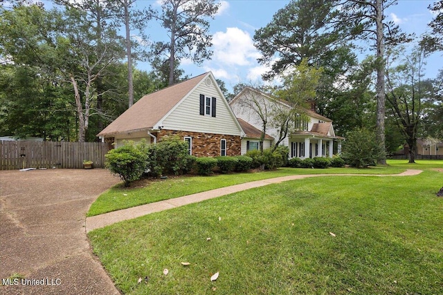 5123 Forest Hill Rd, Byram, MS 39272 - view of front facade with concrete driveway and brick siding
